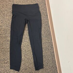 Lululemon Black Crop Leggings w/ back zipper pocket. Size 6